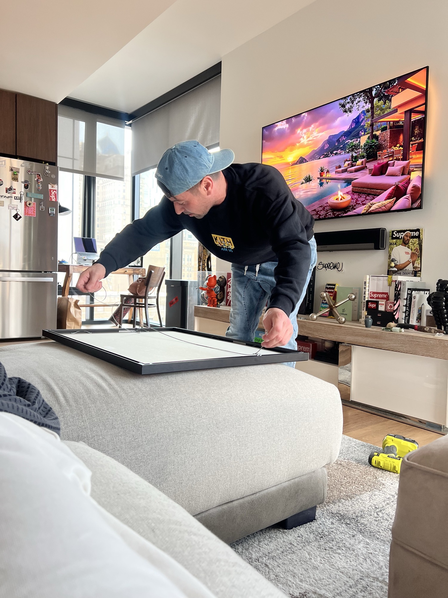 A Never Miss Out artist assembling a custom collector display