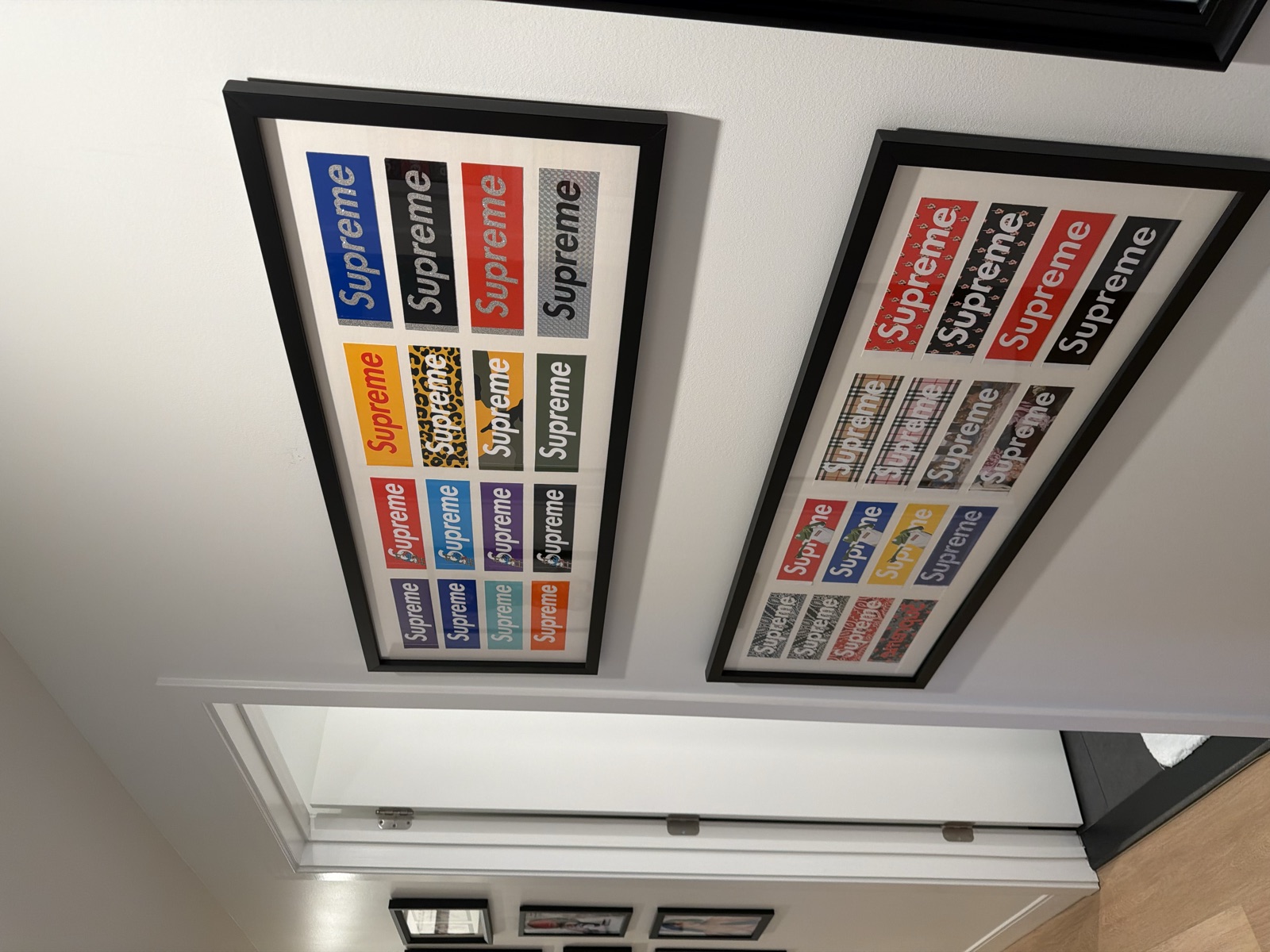 Pair of 16-logo collector displays installed in the hallway