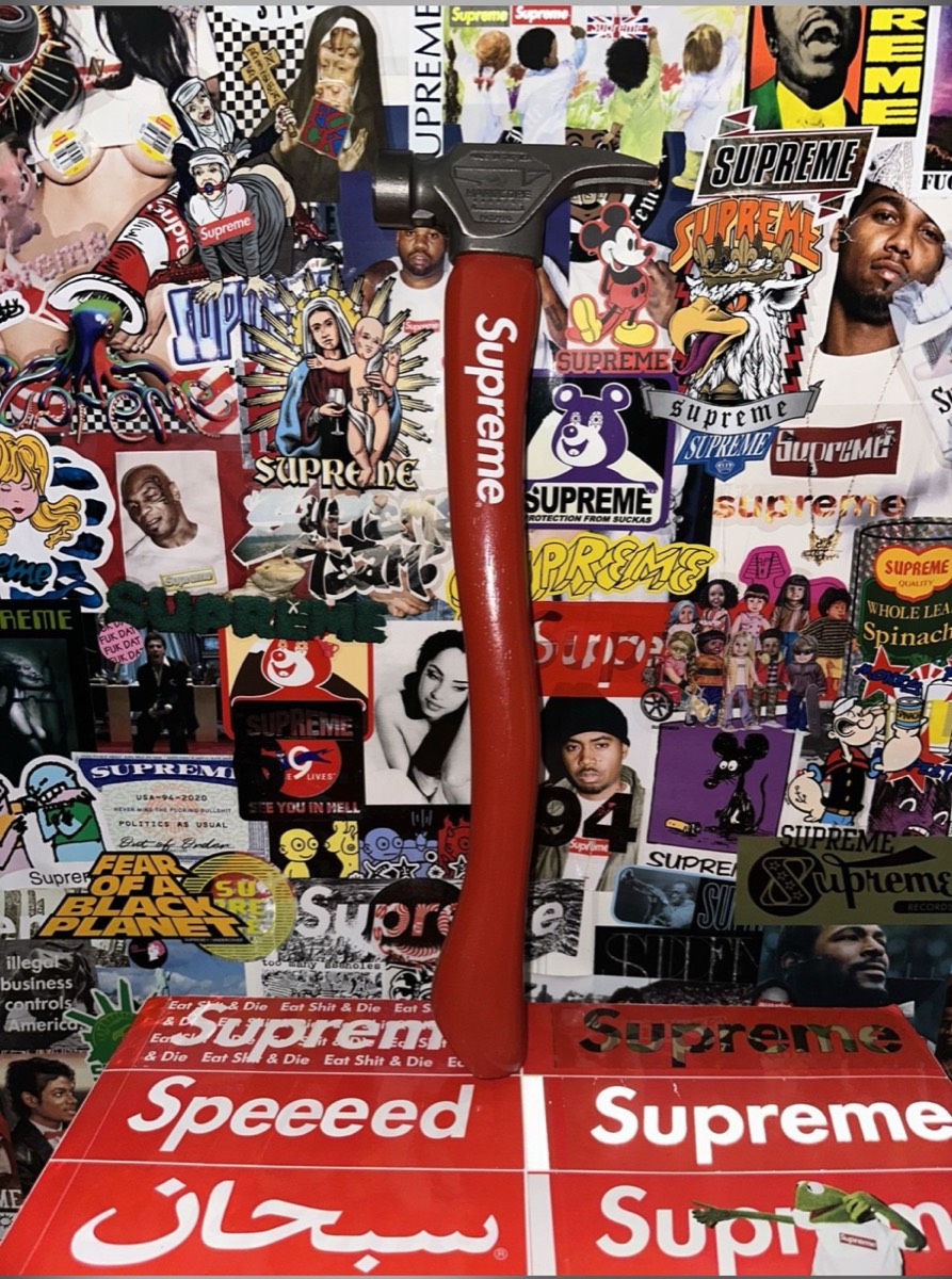 Collector axe displayed on a sticker wall