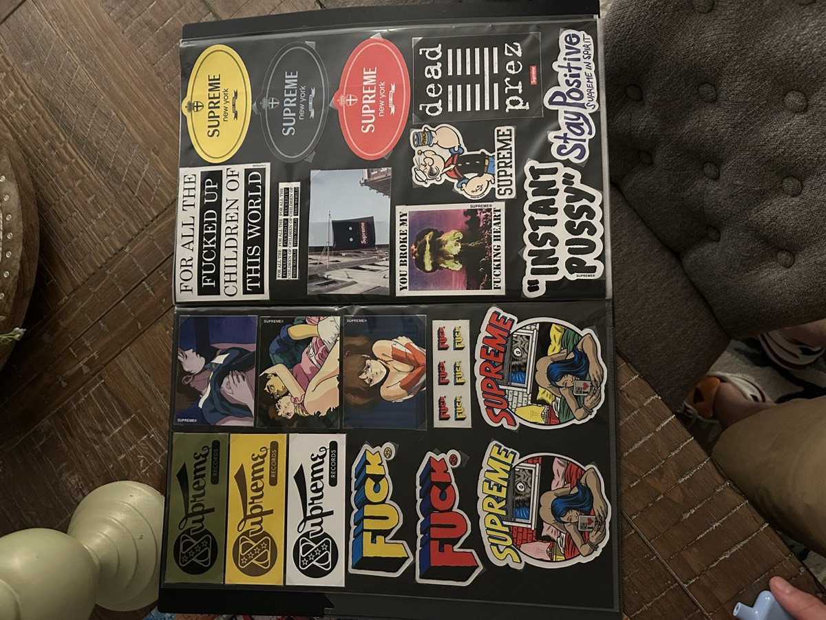 Two open binder pages from our sticker collection