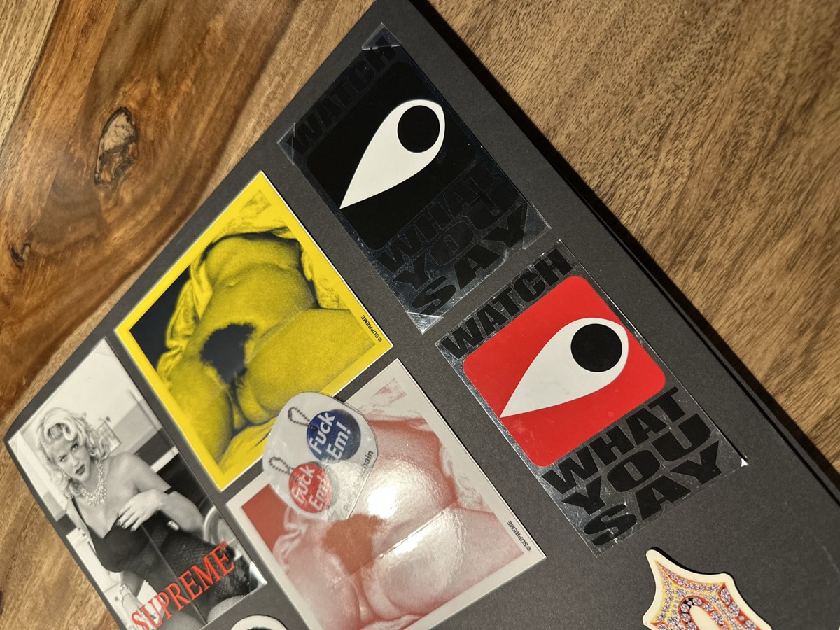 Collector display book featuring printed artwork and ephemera
