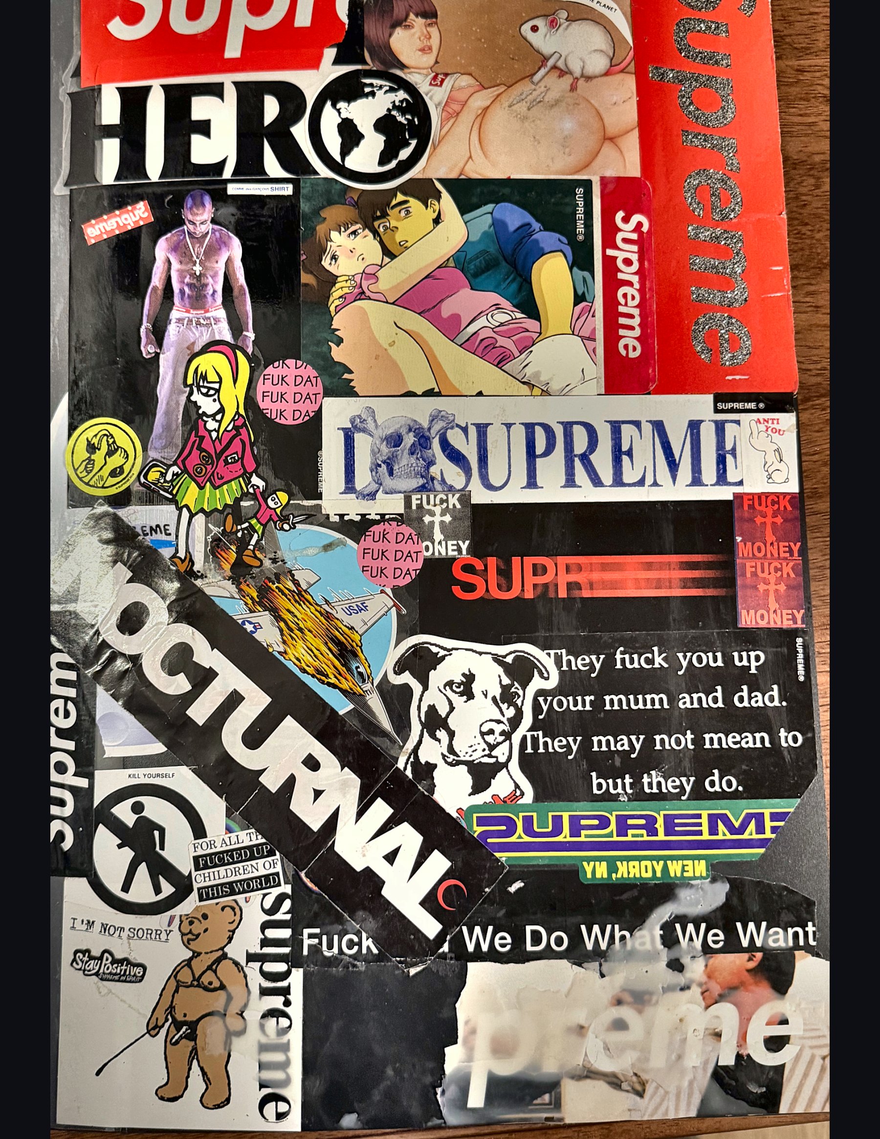 Front cover of the sticker book, collaged with Supreme stickers