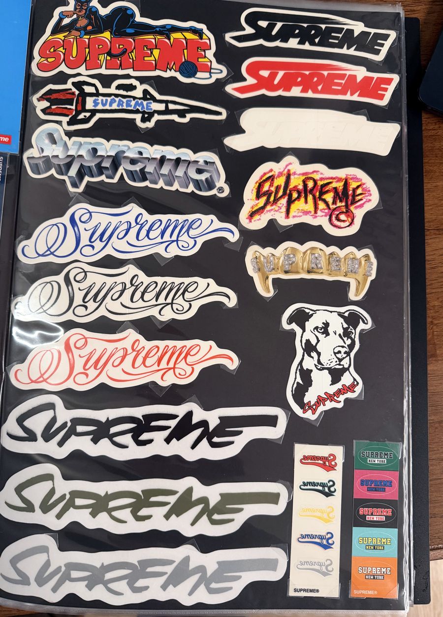 Binder page — Supreme script and brush logo stickers
