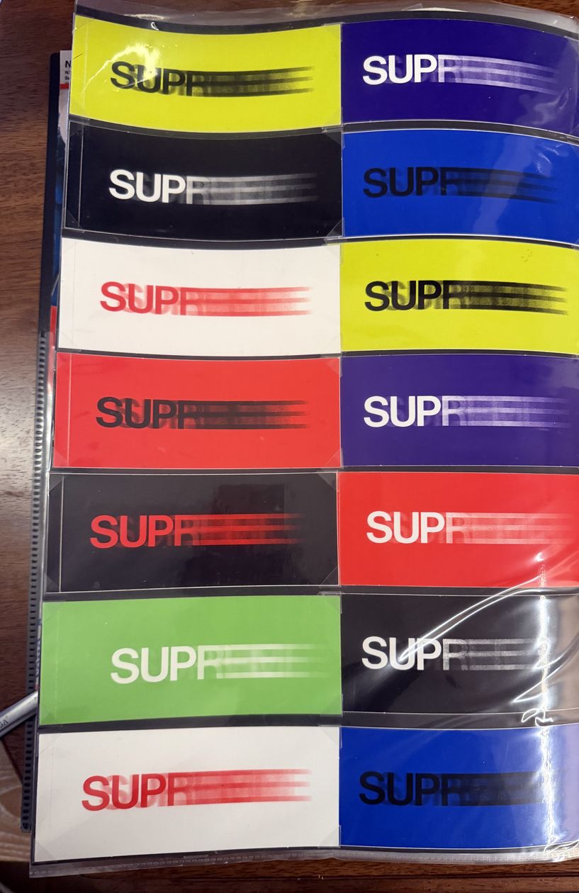 Binder page — motion logo sticker strips in every color