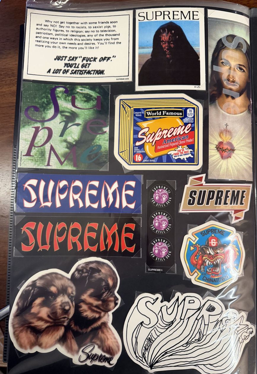 Binder page — World Famous, puppies, and serif Supreme logos